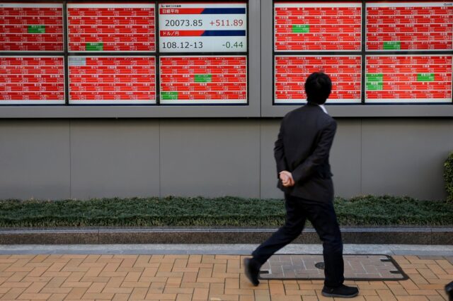 Stocks skid, bonds rally as tariffs stoke recession risk